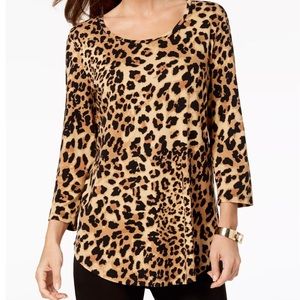 Woman’s 3/4 sleeve animal print top size L